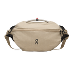 On Sling Pack 9L in biscuit beige with black straps and On logo branding