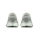 On Cloud X 4 running shoes in tin and iceberg colorway, rear view