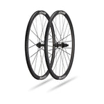 Roval Alpinist CLX carbon wheelset with black rims and spokes on white background