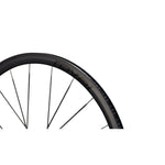 Specialized Roval Alpinist CLX front wheel with satin carbon rim and spokes