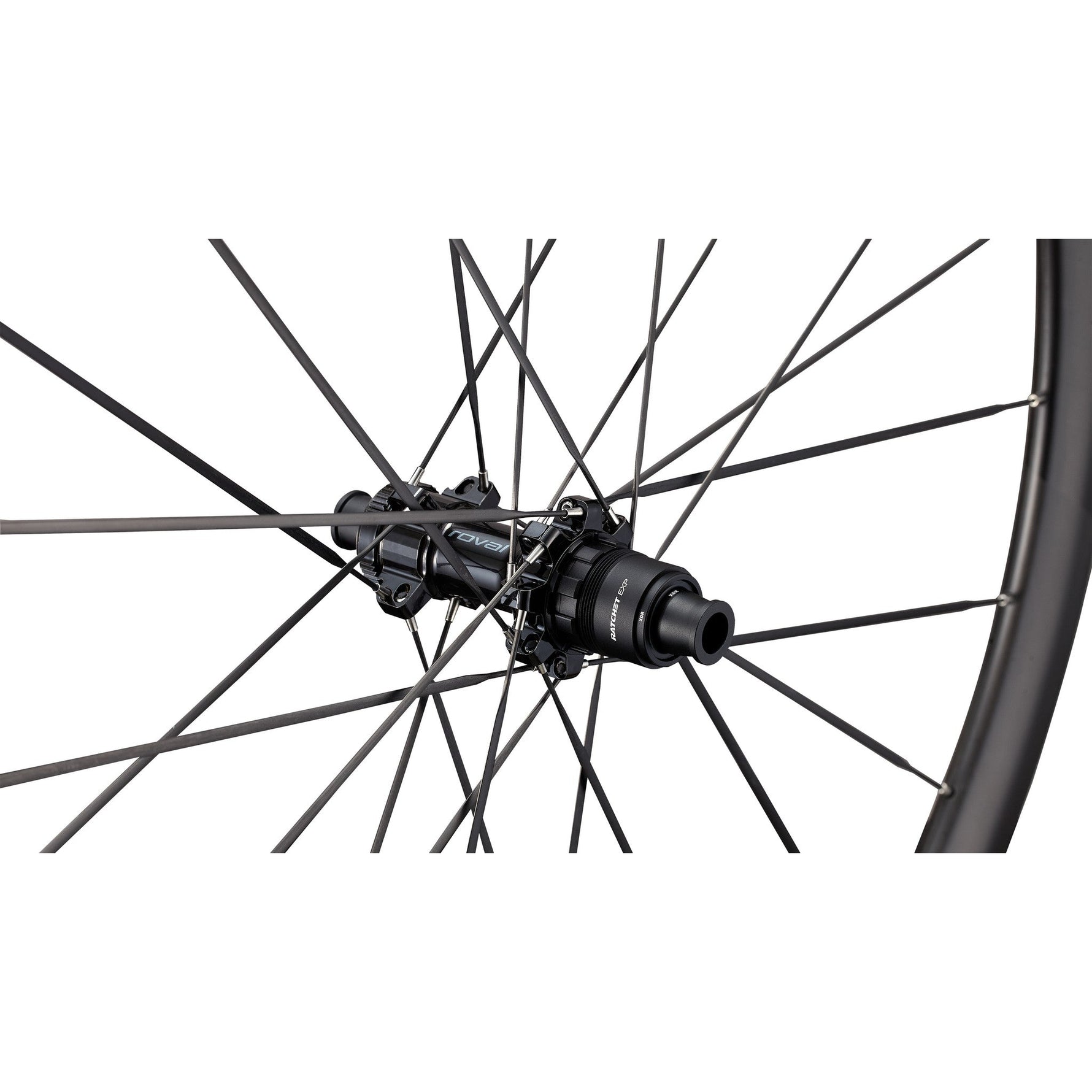 Close-up of Specialized Roval bicycle wheel hub with black spokes against white background