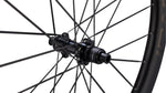 Specialized Roval Terra Aero CLX rear wheel hub detail in black carbon finish