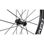 Specialized Roval rear wheel hub with black spokes on clean white background