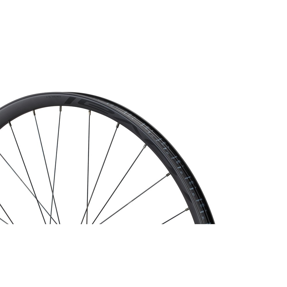 Specialized Roval Control SL V carbon bicycle wheel with black spokes on white background