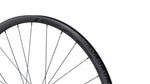 Specialized Roval Control SL V carbon bicycle wheel with black spokes on white background