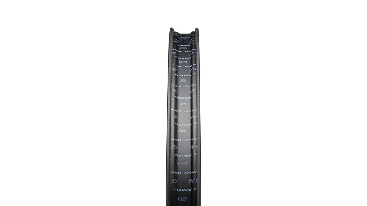 Specialized Roval carbon bicycle wheel rim in satin black with repeated Roval branding