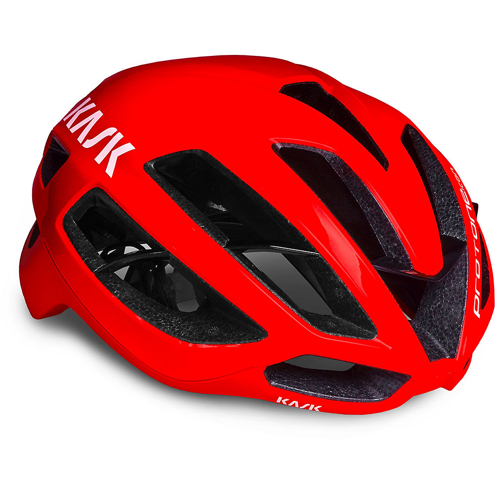Kask Protone cycling helmet in red with white KASK branding and ventilation openings