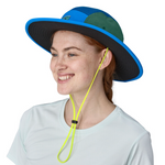 Woman wearing Patagonia Quandary Brimmer hat in blue and green colorblock design