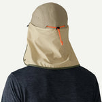 Patagonia Caped Merganzer Hat in tan color with neck cape and orange adjustment cord