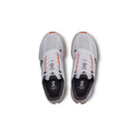 On Cloudsurfer Next women's running shoes in white with flame orange accents, top view