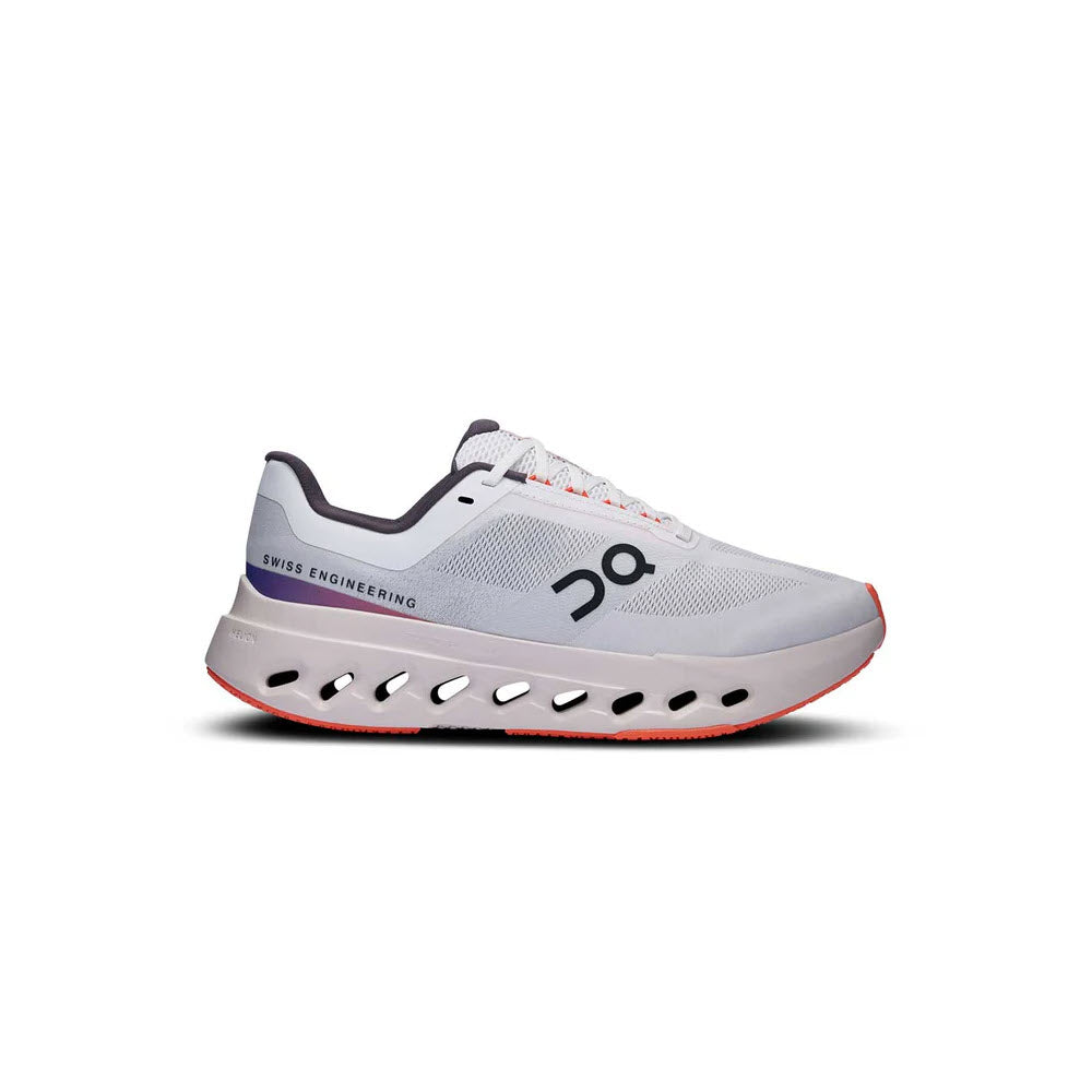 On Cloudsurfer Next women's running shoe in white and flame colorway with CloudTec sole