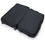 Open black Dakine 365 roller luggage showing dual compartment interior