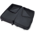 Open black Dakine 365 Roller 100L suitcase showing interior compartments and organization