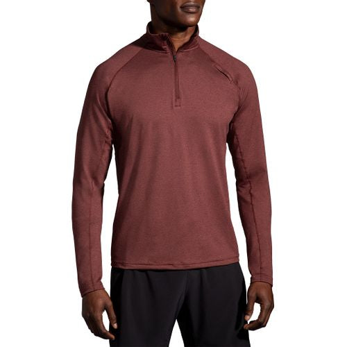 Brooks Dash half-zip pullover in heathered burgundy worn by male model