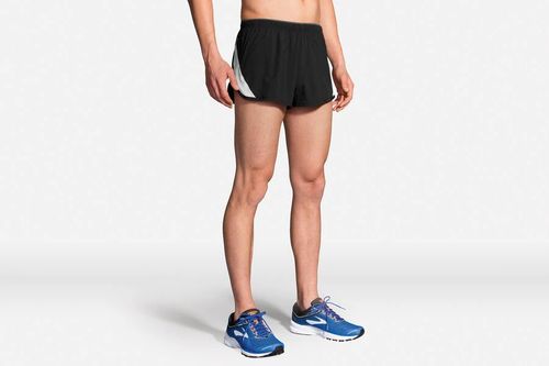 Brooks Go to 2 inch split running shorts in black on male model