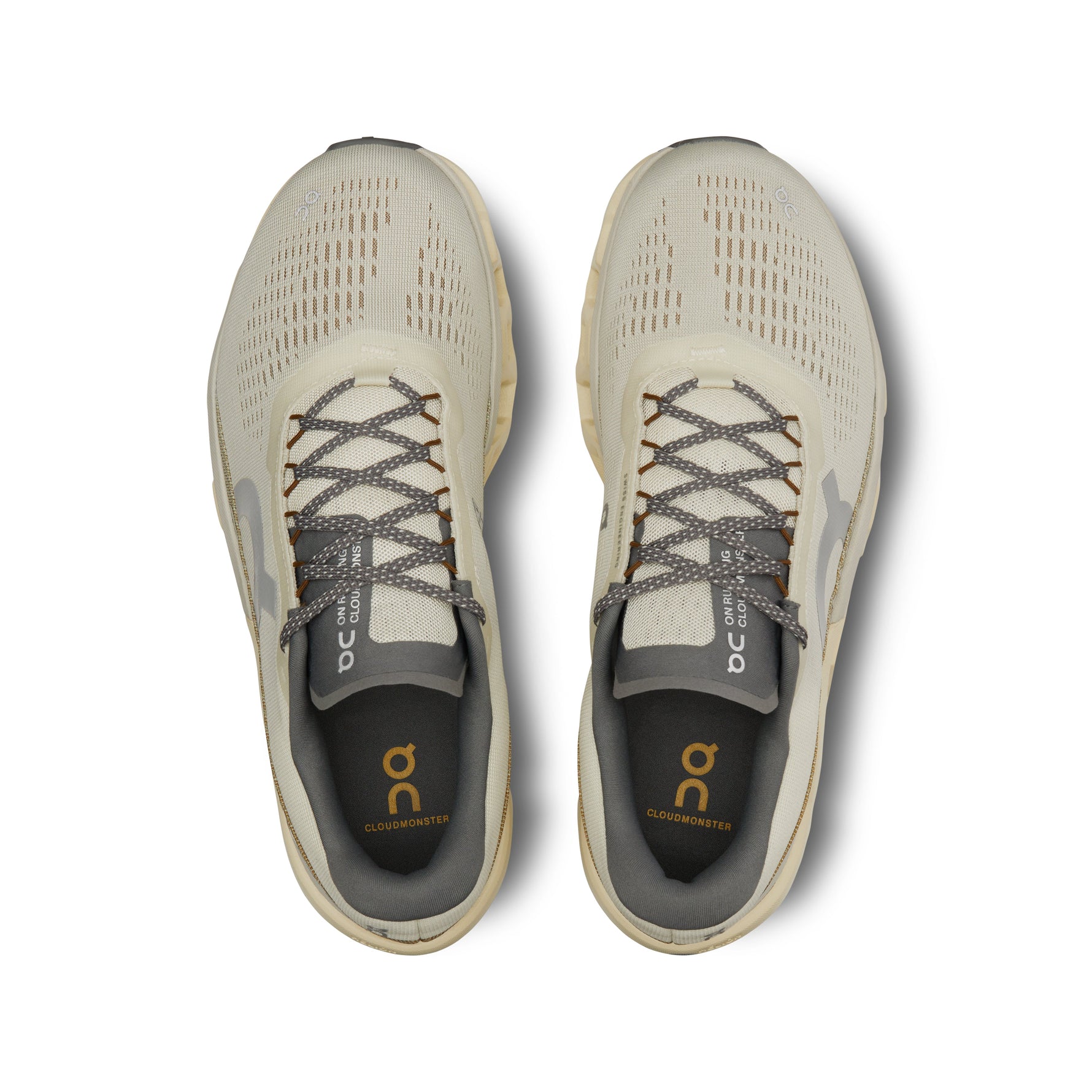 On Cloudmonster 2 running shoes in cream/beige colorway with mesh upper