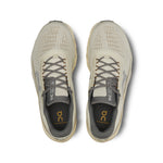 On Cloudmonster 2 running shoes in cream color, top view showing breathable mesh upper