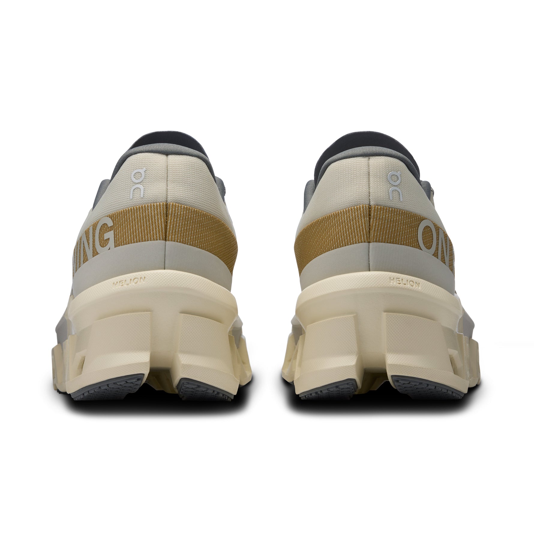 On Cloudmonster 2 running shoes in cream and mustard colorway, rear view
