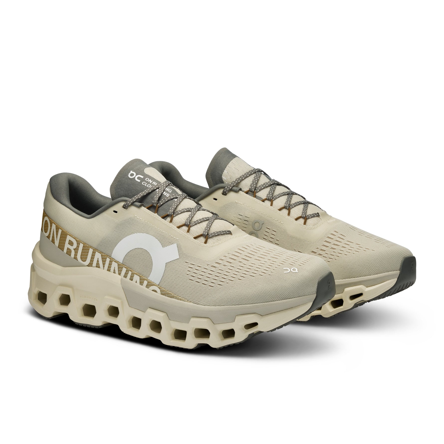 On Cloudmonster 2 running shoes in cream and olive green colorway