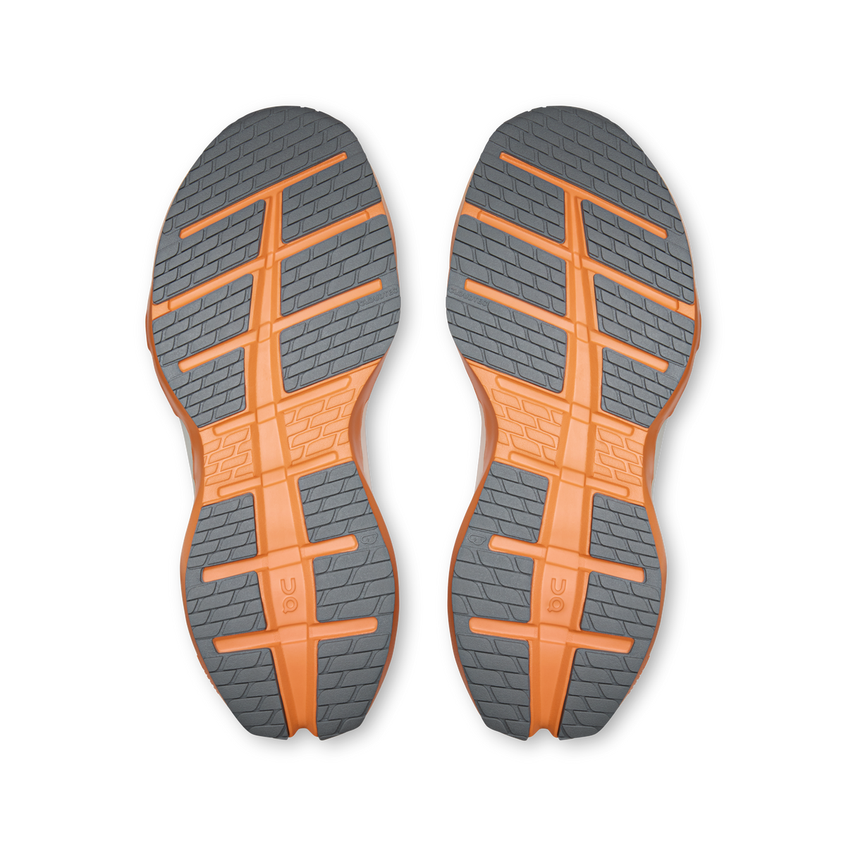 On Cloudrunner 3 Max outsole view showing gray and orange rubber traction pattern on both shoes