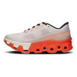 On Cloudmonster Hyper women's running shoe in mauve and flame orange colorway