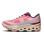 On Cloudmonster Hyper women's running shoe in pink and cream colorway with distinctive cloud sole