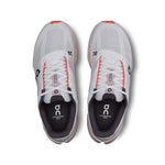 On Cloudsurfer women's running shoes in white with orange flame accents, top view