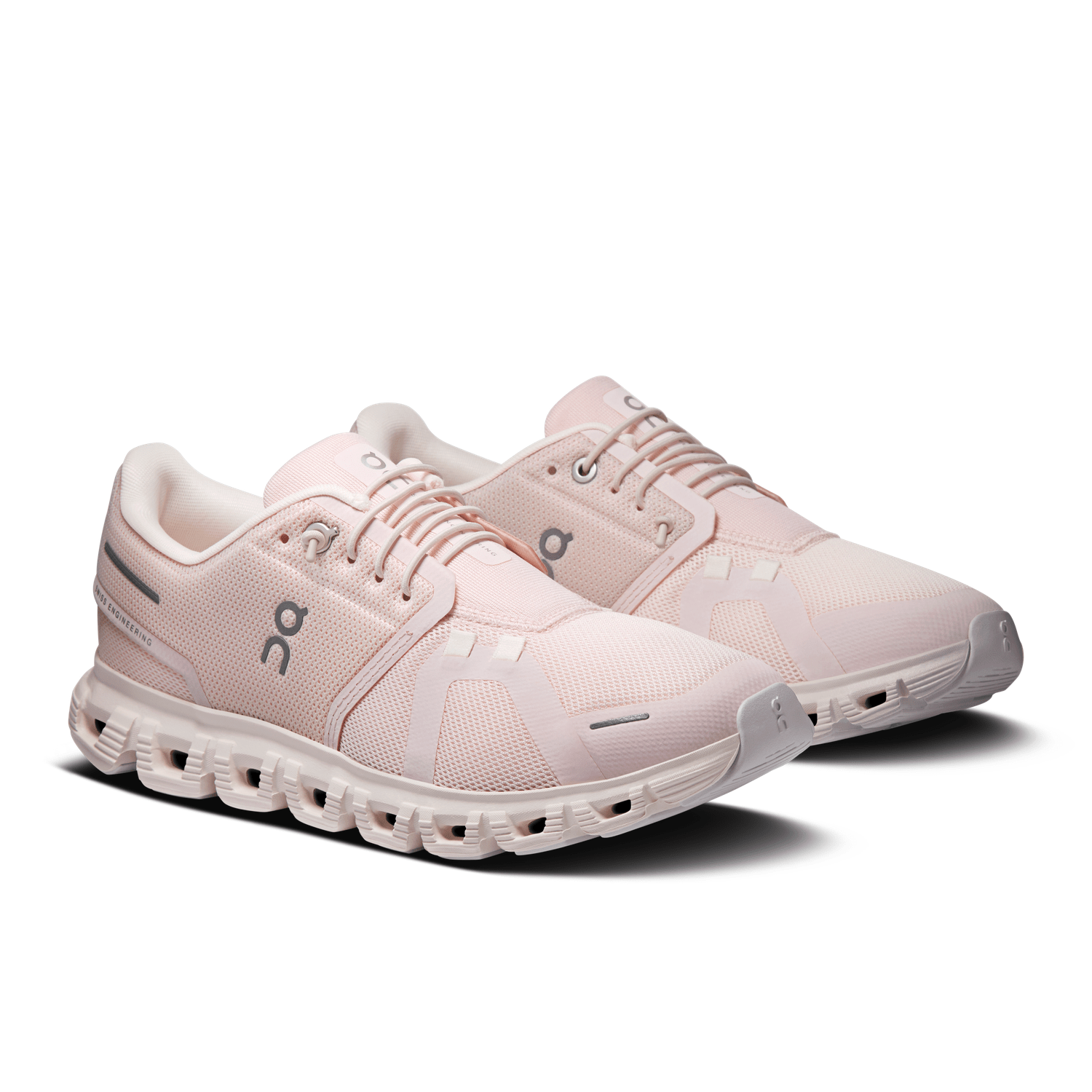 On Cloud 6 women's running shoes in light pink colorway on white background