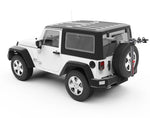 Yakima SpareRide bike rack mounted on white Jeep Wrangler spare tire