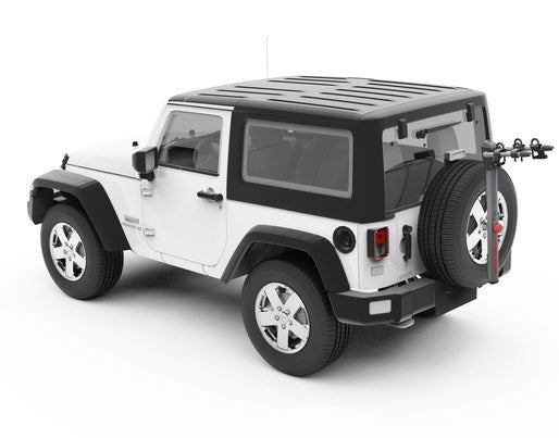 Yakima SpareRide bike rack mounted on white Jeep Wrangler spare tire