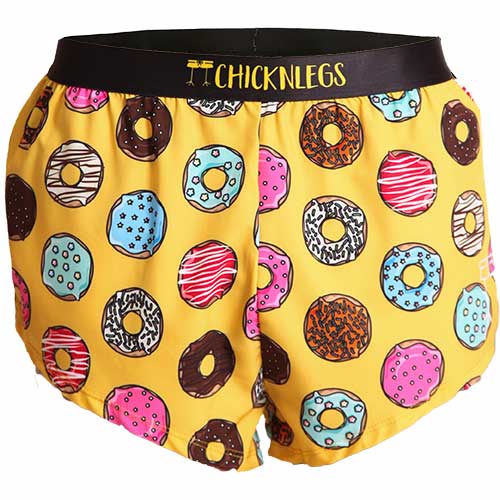 ChicknLegs men's running shorts in yellow with colorful donut print pattern