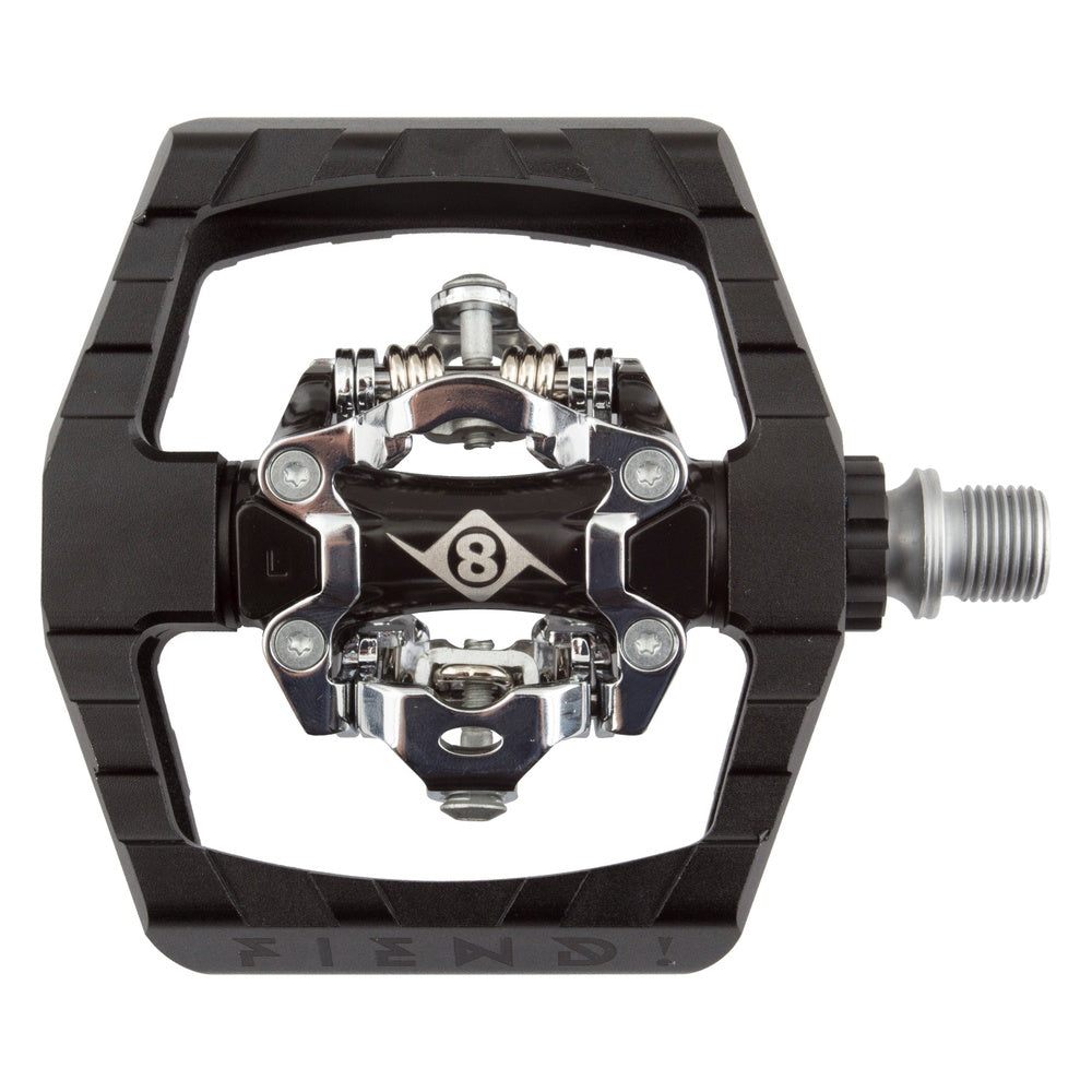 Origin8 dual clipless mountain bike pedal with black platform and silver hardware