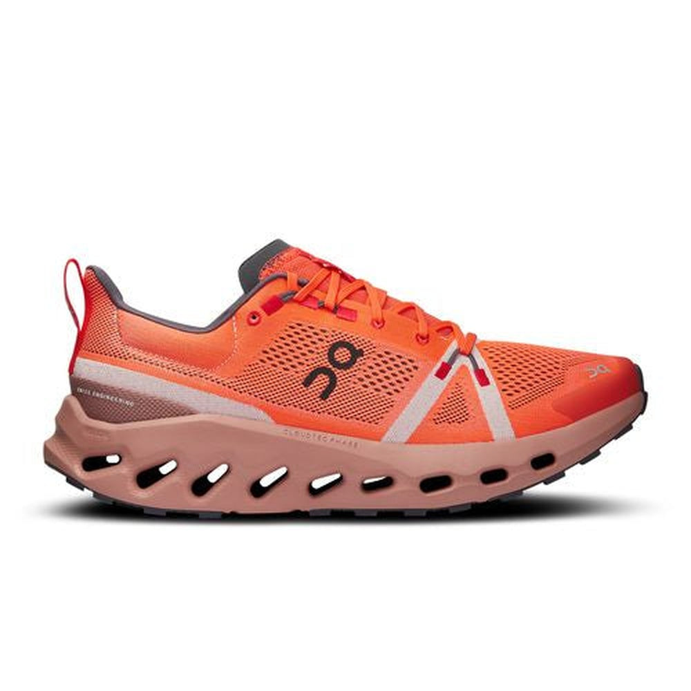 On Cloudsurfer trail running shoe in flame orange with dusty rose sole