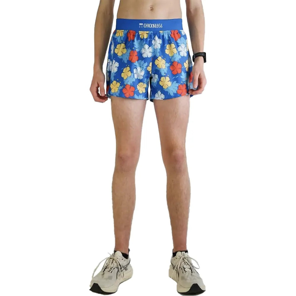 ChicknLegs men's blue running shorts with colorful flower pattern on model
