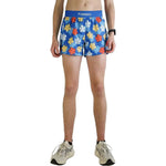 ChicknLegs men's blue running shorts with colorful flower pattern on model