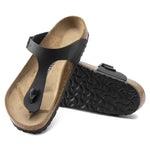 Black Birkenstock Gizeh sandals with ankle strap and cork footbed