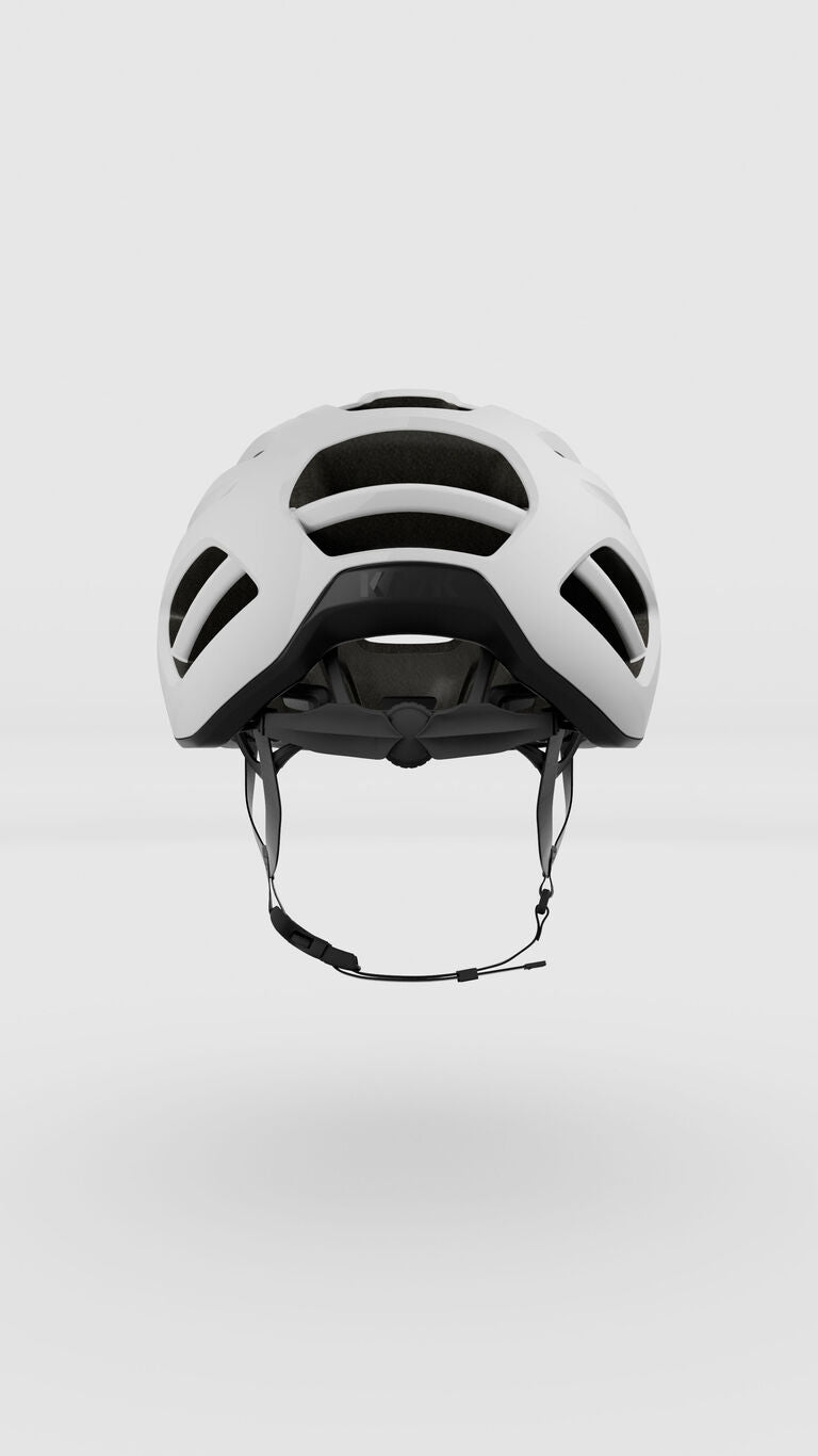 White KASK Caipi cycling helmet with ventilation holes on clean background