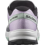Salomon Outrise running shoe heel view showing purple upper with green accents