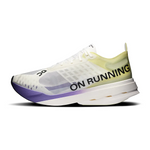 On Cloudboom Strike running shoe in white with lime green gradient