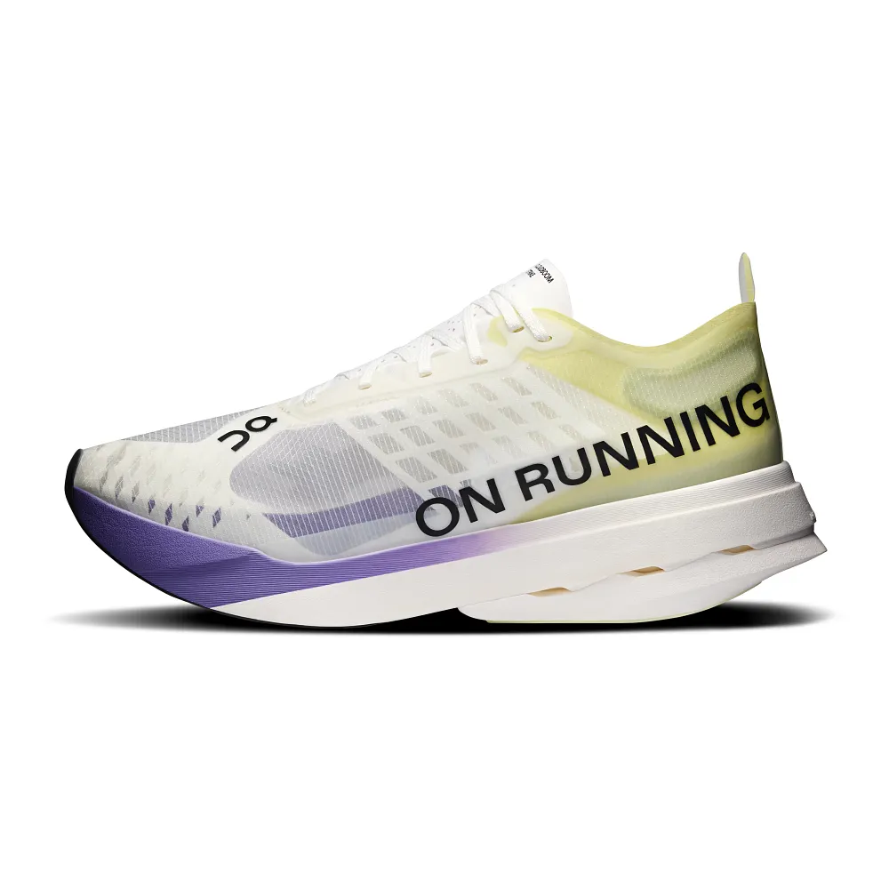 On Cloudboom Strike running shoe in white with lime green gradient