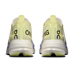 On Cloudboom Strike running shoes in lime green colorway, rear view showing heel design
