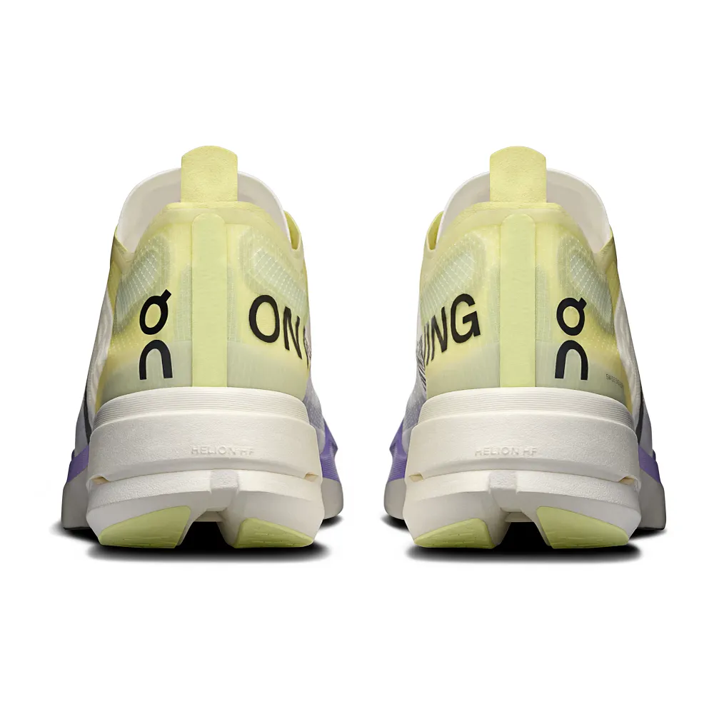 On Cloudboom Strike running shoes in lime green colorway, rear view showing heel design