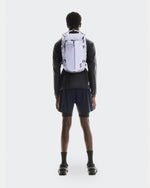 On Speed Pack 18L LiteMagnet backpack in thistle purple worn by model