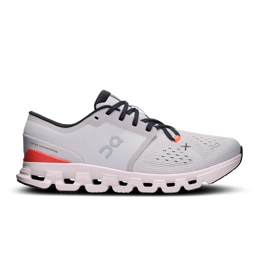 On Cloud X 4 women's running shoe in silver with flame orange accent