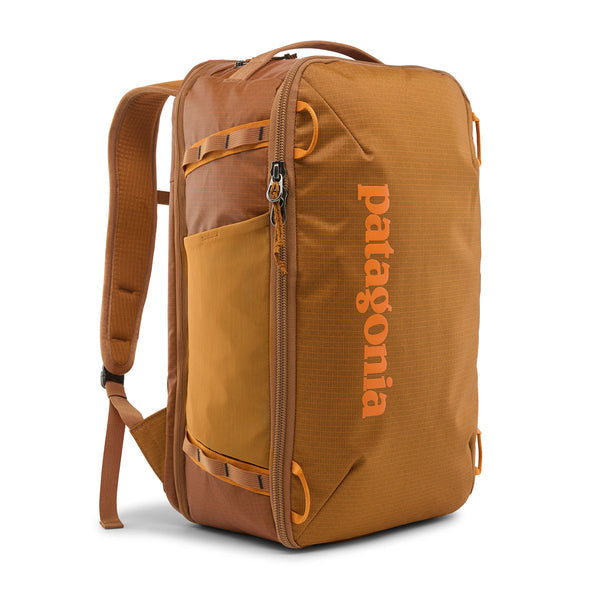 Patagonia Black Hole Mini MLC backpack in Cinnamon Brown with orange logo and zippers