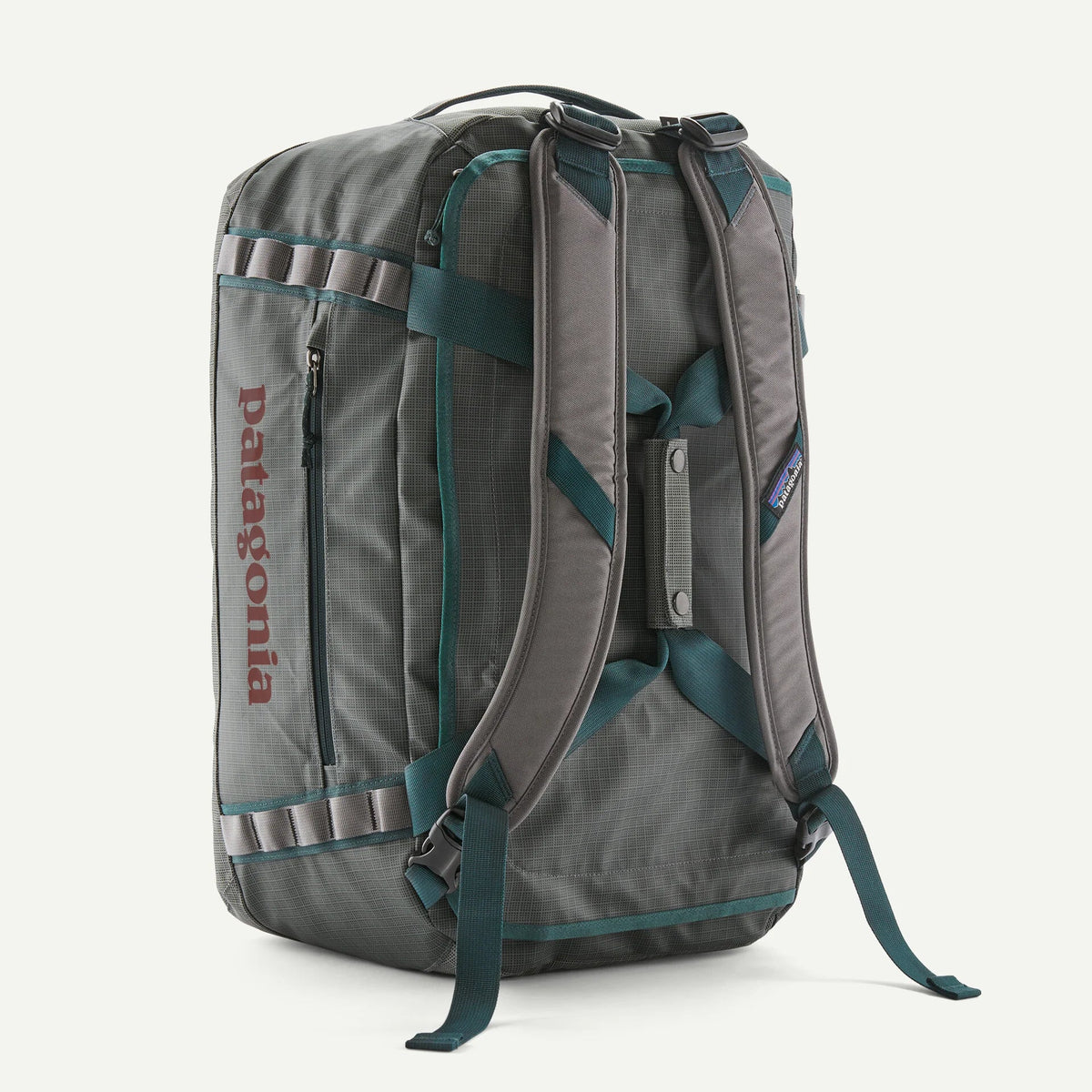 Patagonia Black Hole 40L duffel bag rear view showing backpack straps in Noble Grey colorway