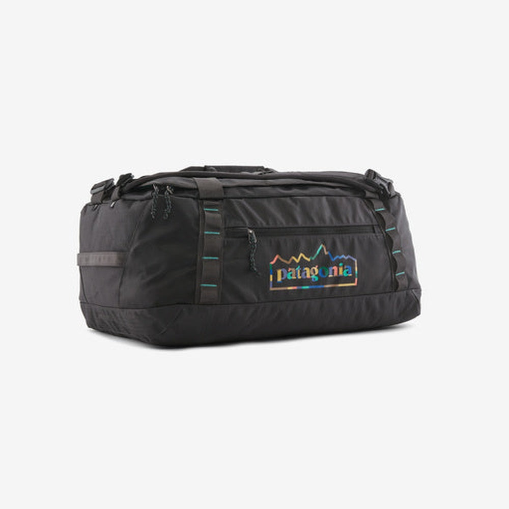 Patagonia Black Hole duffel bag in black with rainbow logo on clean white background