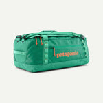 Patagonia Black Hole Duffel 55L in Basin Green with orange logo and zipper details
