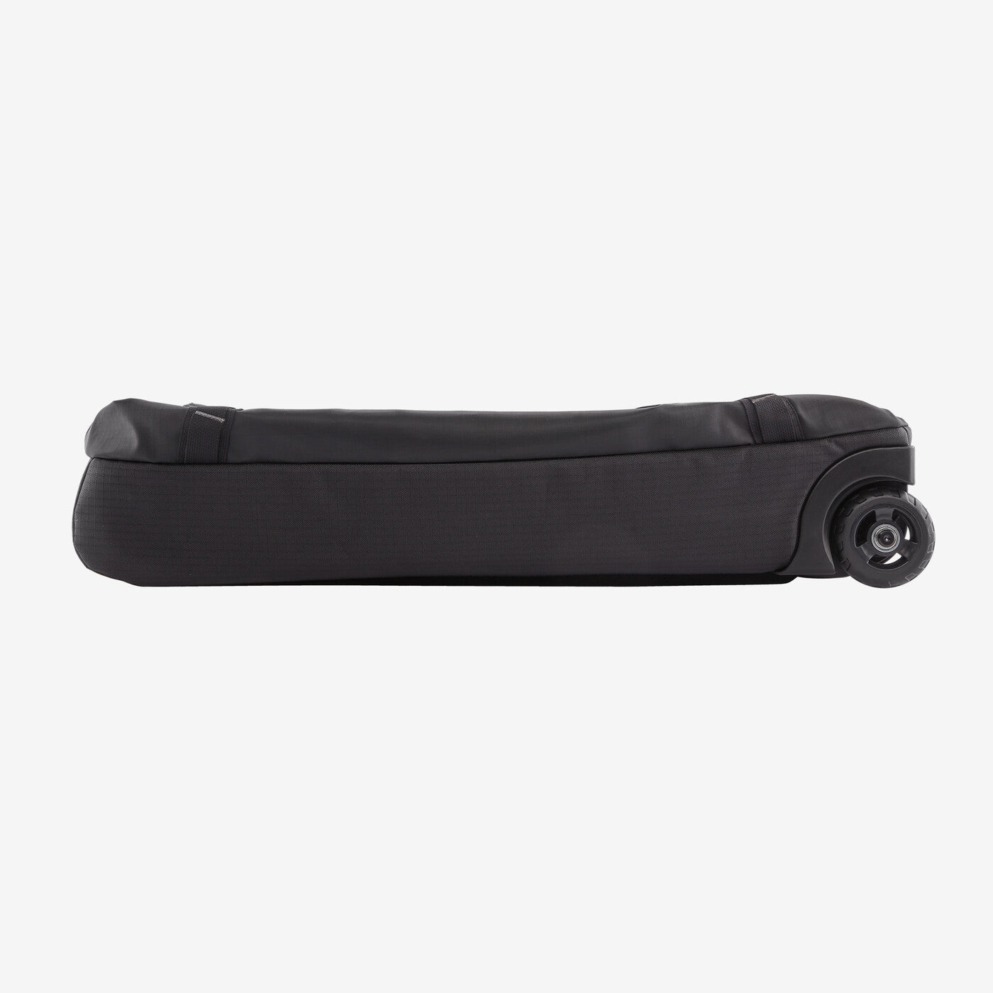 Black Patagonia Black Hole wheeled duffel bag lying flat on white background