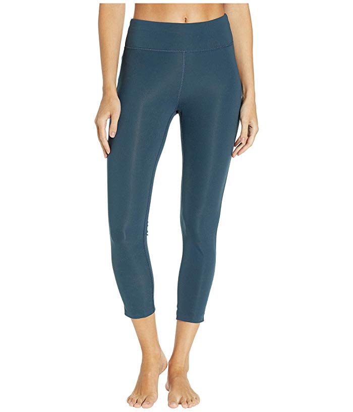 Women's ON Running Tights 7/8 in sea blue color on model
